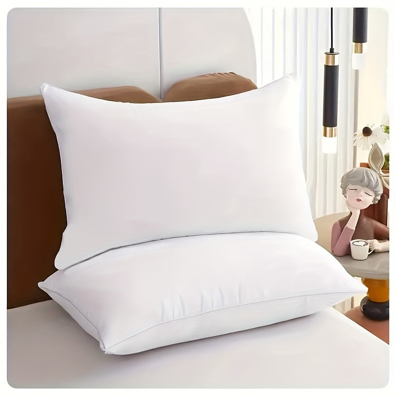 Get two sets of white pillowcases that are perfect for families, hotels, and apartments. These pillowcases provide a comfortable experience with their soft and breathable material. Made of high-quality fabric, they are suitable for bedroom, sofa, and