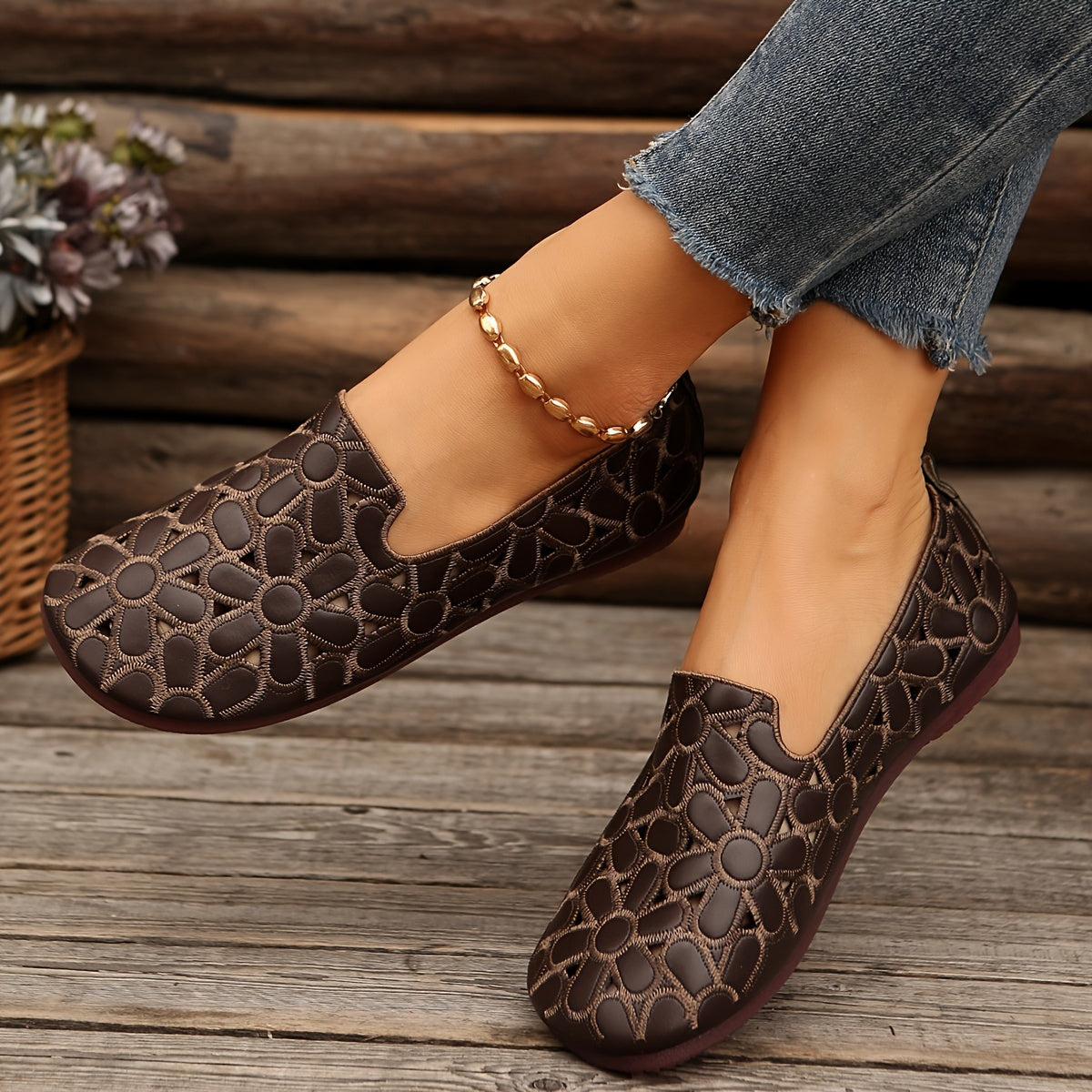 Stylish women's slip-on flats feature embroidered flowers, faux leather, breathable hollow design, and soft sole for year-round wear.