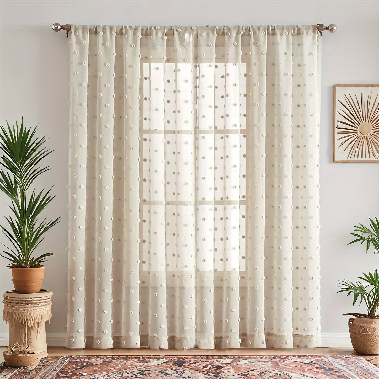 Sheer panel with rod pocket top featuring boho-style polka dot embroidery - crafted from imitation hemp fabric. This machine-washable drapery offers room darkening benefits for a variety of living spaces. With easy hanging and a fresh minimalist design