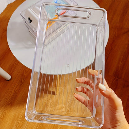 The Clear Acrylic CD/DVD Storage Basket is a sturdy and stylish solution for storing your media collection. This space-saving display rack can hold up to 20 standard cases, making it perfect for organizing your albums and games. Its durable construction