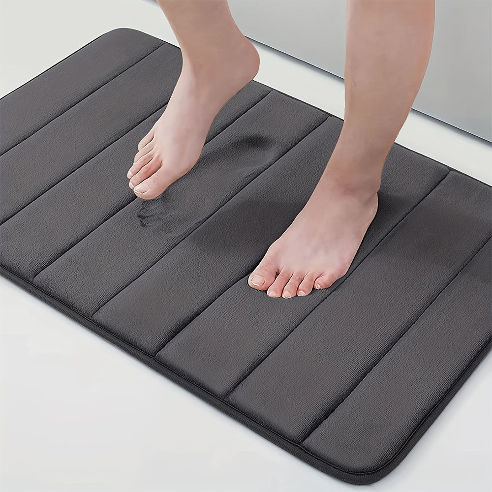 1 piece of Memory Foam Bath Mat designed for the bathroom, featuring a non-slip surface and thickened soft material that quickly absorbs water and dries fast. This machine-washable mat can also be used as a shower mat, living room or bedroom entrance