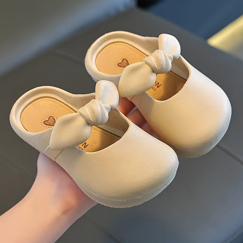 Stylish bowknot slip-on sandals for girls, perfect for indoor and outdoor wear.