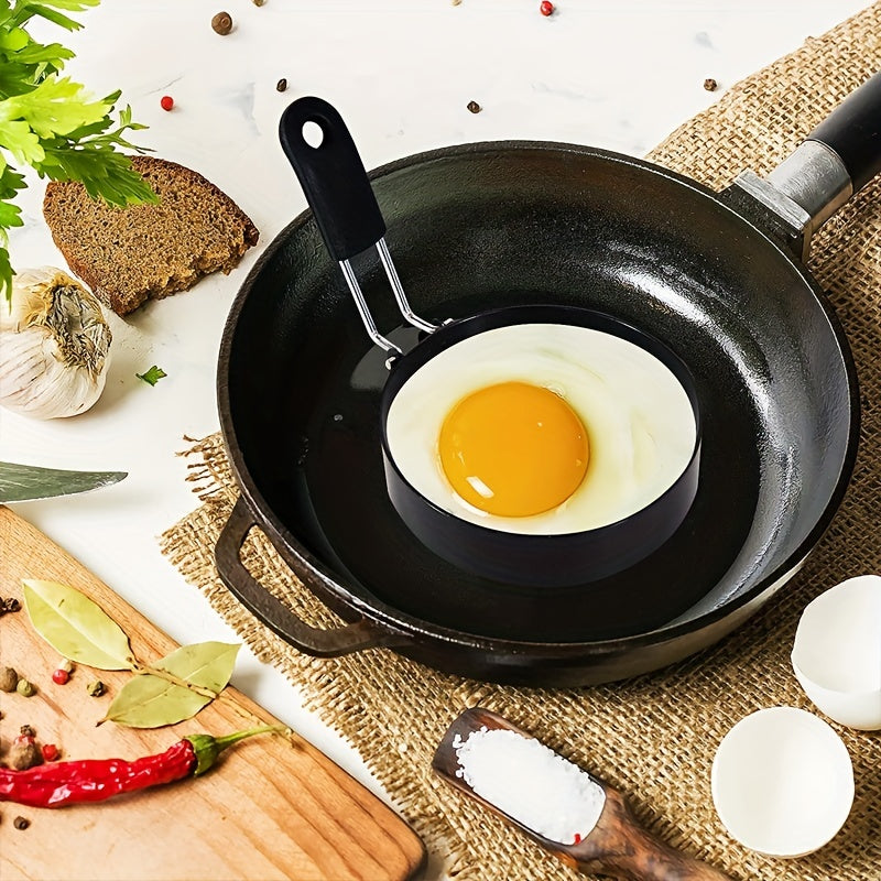 Set of two stainless steel egg frying rings measuring 10.16 cm, ideal for cooking perfectly shaped eggs, pancakes, scrambled eggs, and omelets. A must-have kitchen gadget for any home cook looking to elevate their breakfast game.