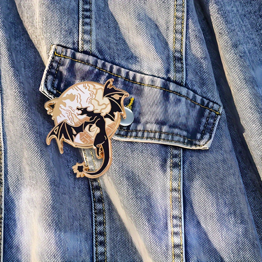 Enamel pin features a Fourth Wing Dragon design, perfect for adding a touch of cuteness to any outfit. This unique alloy collar pin is a stylish and versatile gift for jackets, bags, and hats. Perfect for women who love to accessorize with fun and quirky