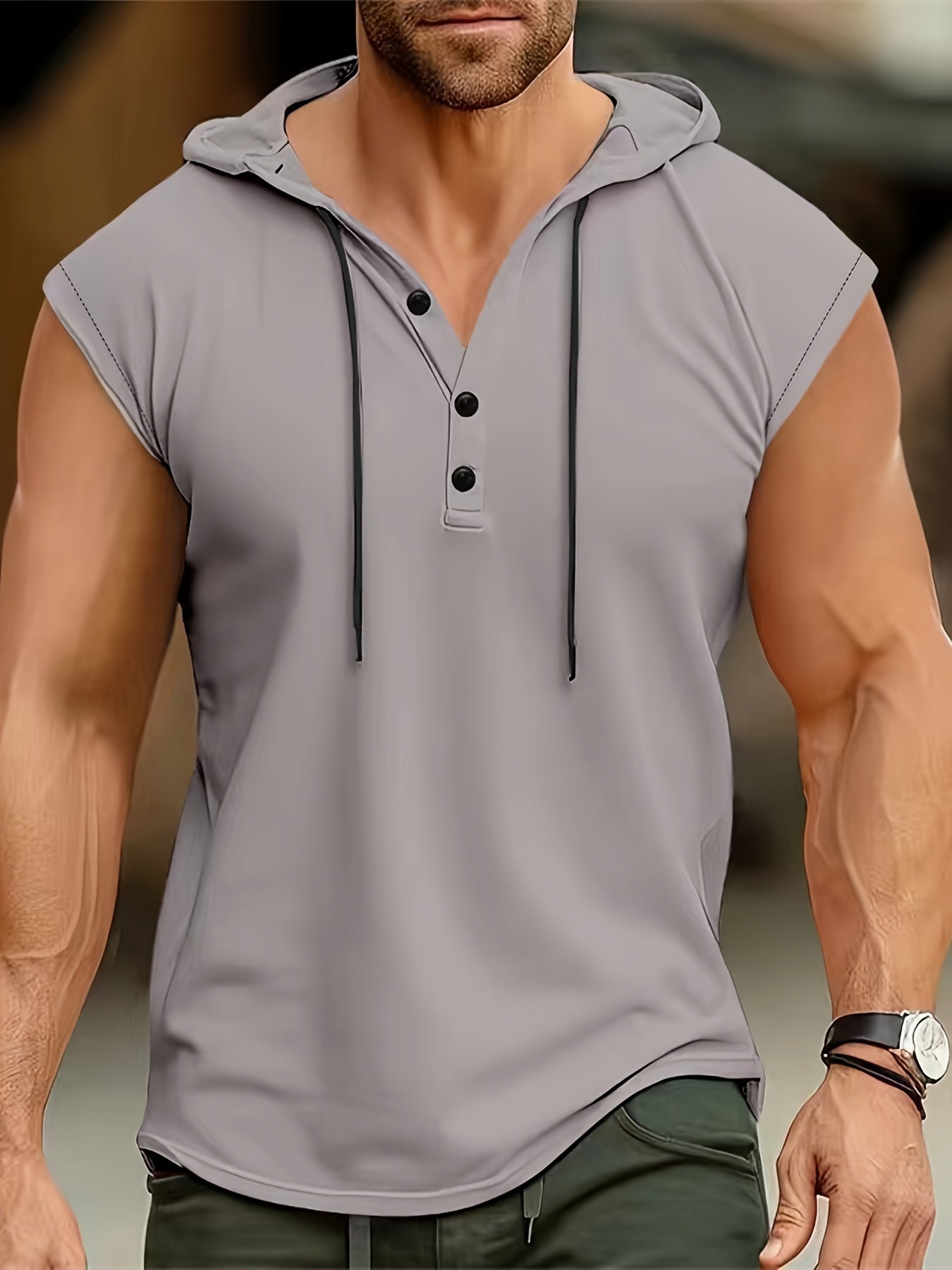 Lightweight, breathable polyester sleeveless hooded Henley shirt for men, perfect for summer casual or sporty wear. Features button detailing and is machine washable.