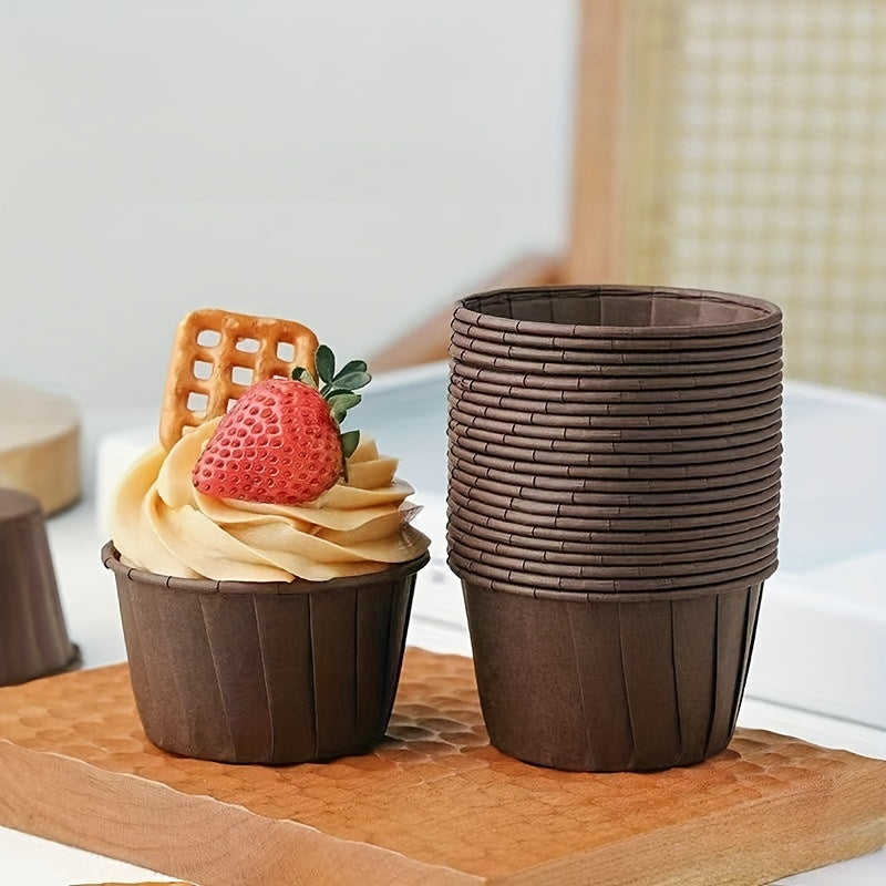 50 disposable muffin cups made of heat resistant paper, perfect for cupcakes and muffins. These baking tools are essential kitchen gadgets and accessories for any home kitchen.