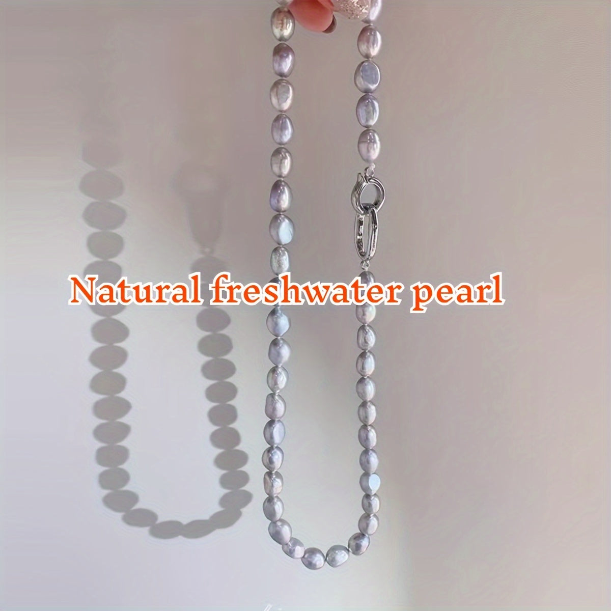 Beautiful French-inspired freshwater pearl necklace featuring distinctive gray baroque pearls, perfect for adding a touch of elegance to any outfit. Whether paired with casual attire or worn for a special occasion, this necklace is versatile and chic