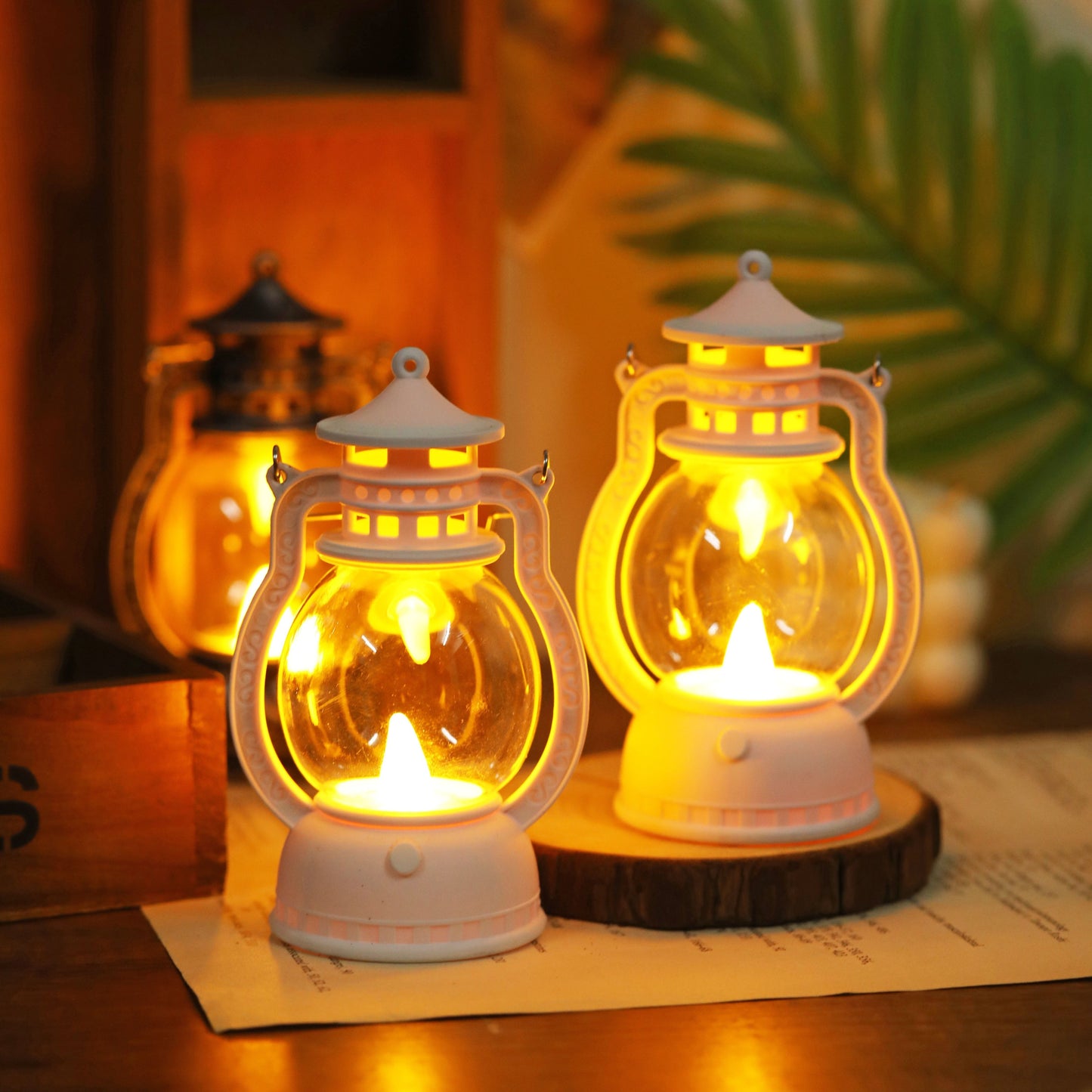 Mini LED lantern with battery included, ideal for decoration in bedroom, desk, wedding, party, or holidays. Made of plastic with faux candle light, non-rechargeable button battery included.