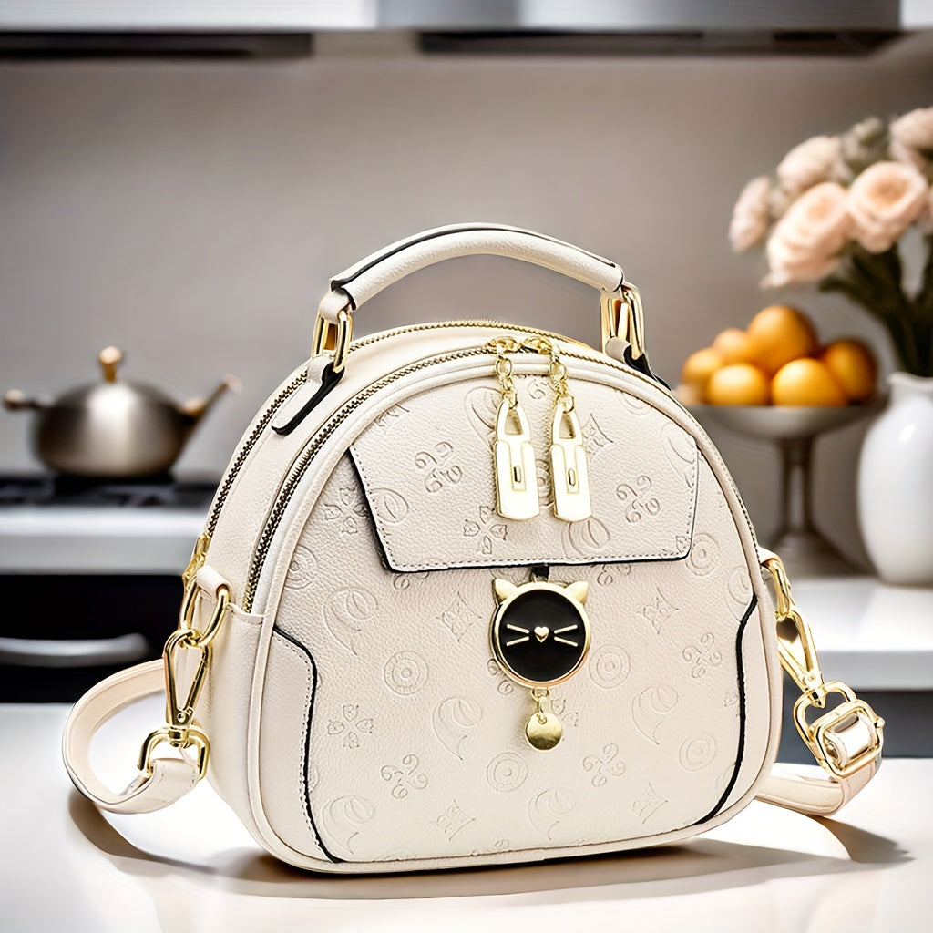 Trendy black round crossbody bag with adjustable strap, golden-tone hardware, "LOVE" design, zipper closure. Ideal for casual outings and commuting.