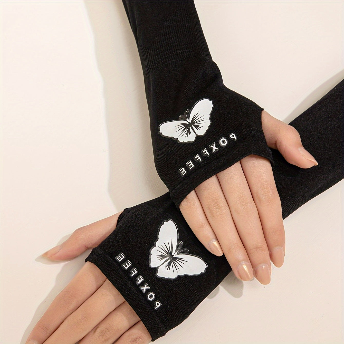 Butterfly print sun-proof arm sleeves for women, polyester elastic material, noctilucent design, weekend casual style, printed craftsmanship.