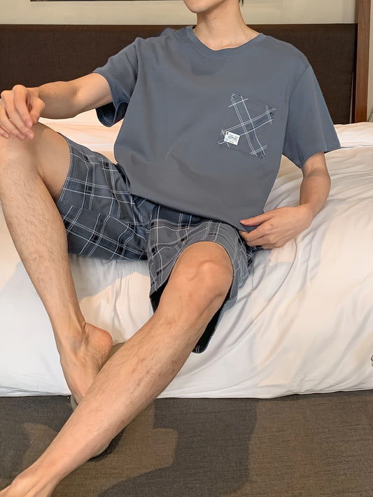 Men's stylish and comfortable 2-piece cotton pajama set with short sleeve top and shorts for lounging at home.