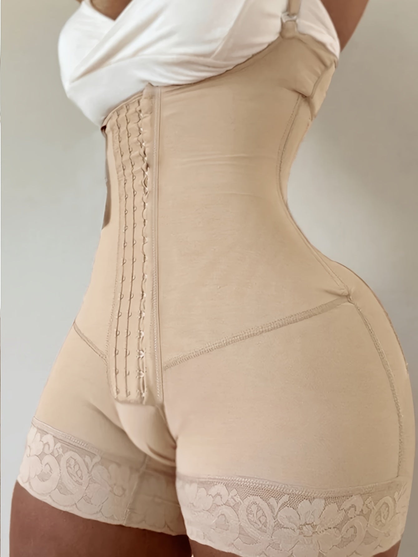 Nylon bodysuit with 4-row hook, postpartum tummy control, waist cincher, full coverage, lace detail, solid color, mid-support, knit fabric, suitable for daily or evening wear.