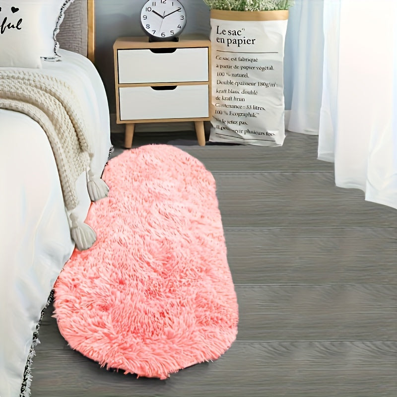 Soft faux fur oval area mat that is luxurious, plush, non-slip, hand washable, and durable. Perfect for adding a touch of elegance to your bedroom, living room, or home decor. Available in two sizes.