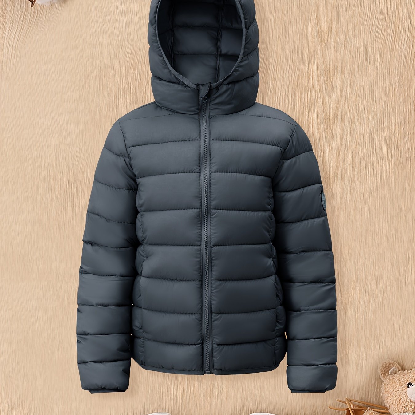 Boys' cozy hooded zip-up coat ideal for chilly weather.