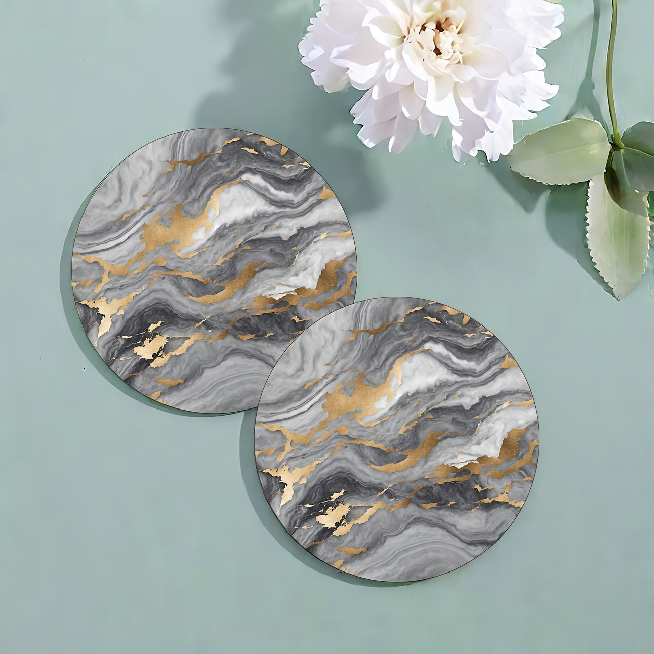 6 golden marbled coasters with absorbent rubber and non-slip backing, perfect for home decor or as a housewarming gift, each 10.16 cm in diameter.