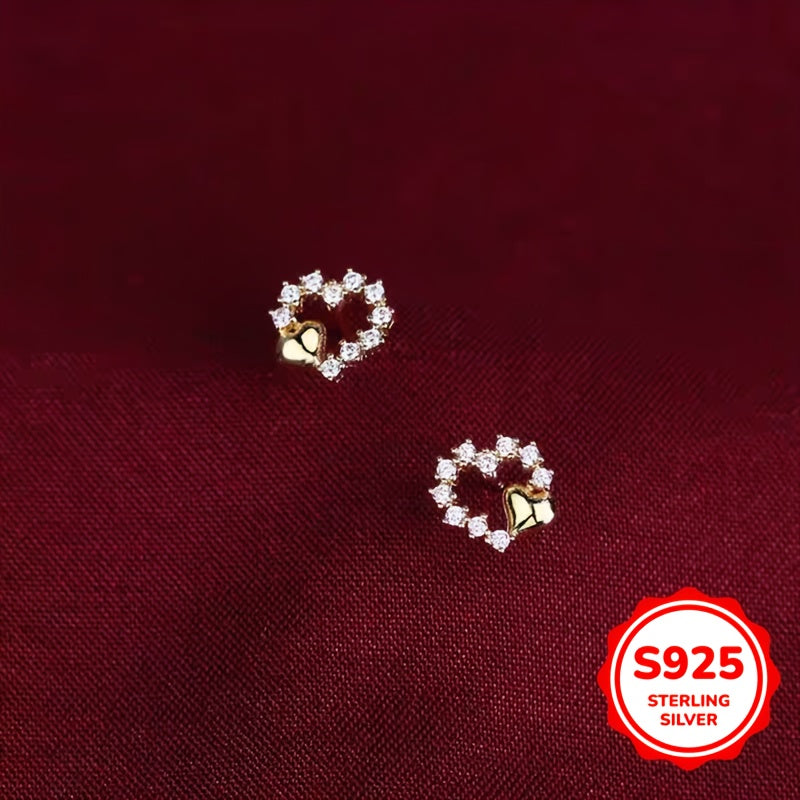 These graceful heart-shaped earrings are crafted from S925 silver with synthetic zirconia stones. Their simple and minimalist design is perfect for girls who prefer a cool and elegant style. These versatile earrings make a great gift for birthdays or