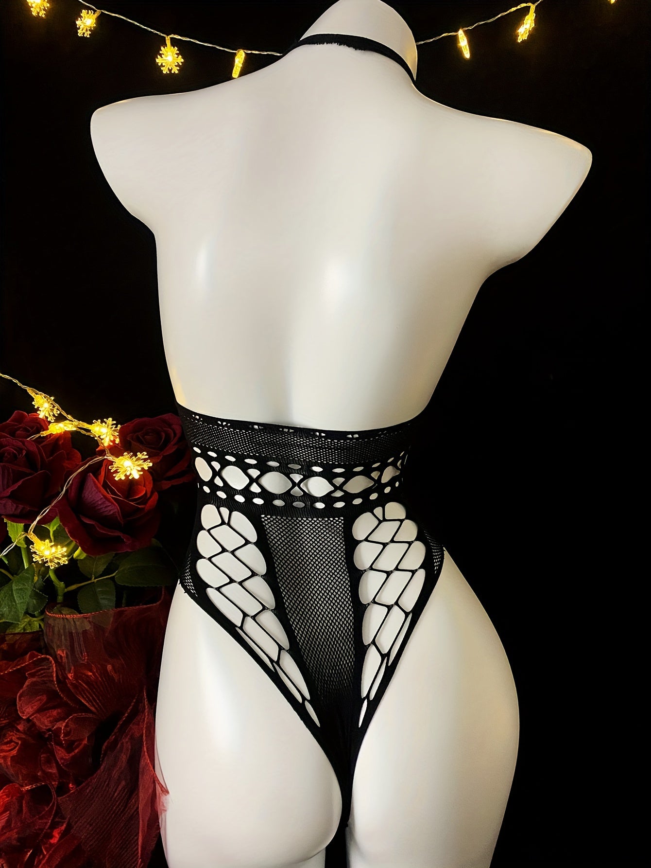 Sexy body stocking with open crotch and see-through design, perfect for music festivals and beachwear.