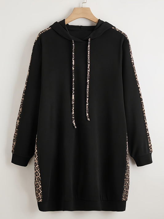 Black hoodie with leopard print accents, long sleeves, drawstring hood, and pockets. Made from polyester knit, oversized fit.