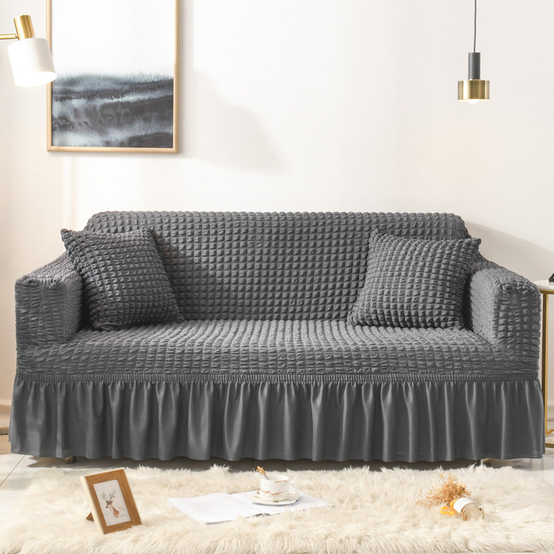 Stretch sofa slipcover with skirt, washable and durable, universal fit.