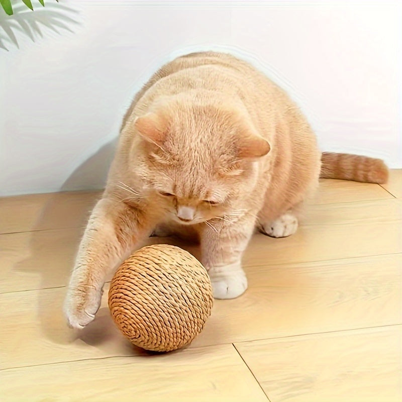 Interactive sound-making cat scratching ball toy made of cardboard material for cats to relieve play with their pet companion.