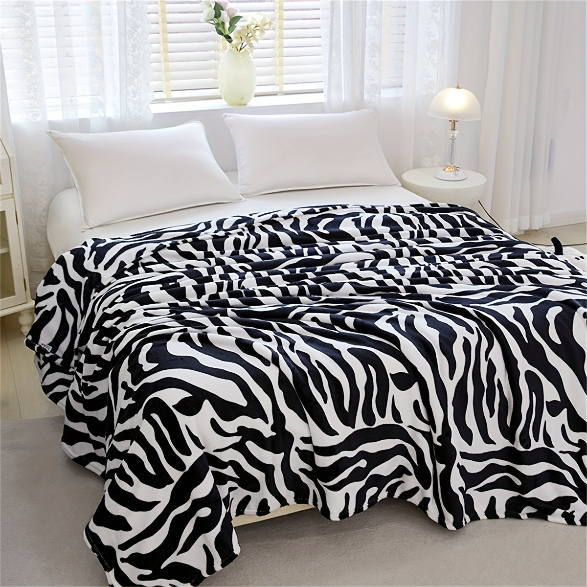 Zebra Patterned Blanket, Luxuriously Soft Throw Blanket Ideal for Snuggling Up on the Couch, Sofa, Office, Bed, Camping or Travel. The perfect multi-purpose gift blanket that can be used in all seasons.