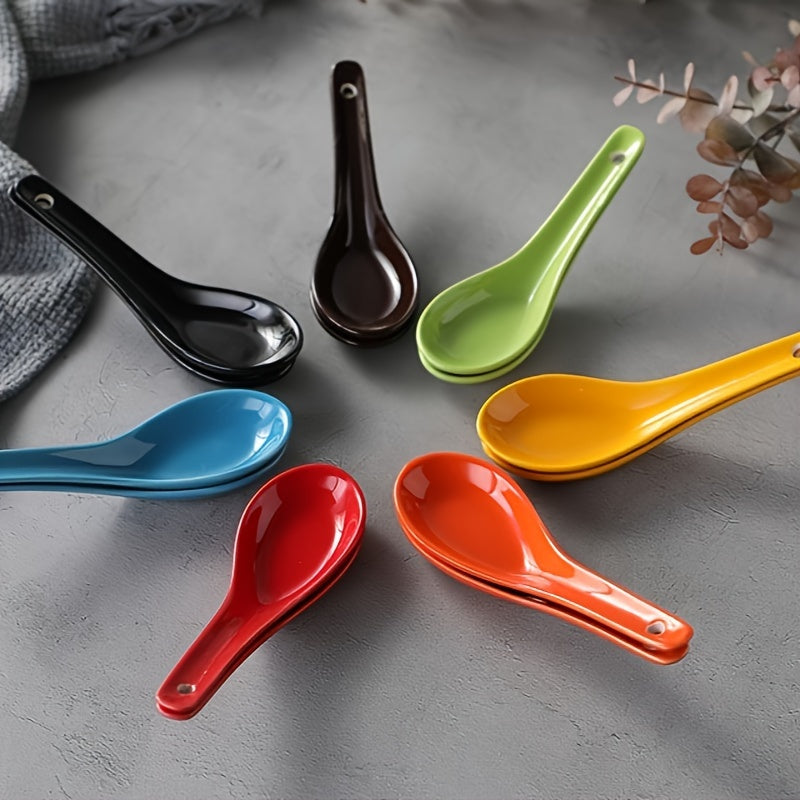 6-piece set of white ceramic soup spoons for various dishes, safe to use in microwave, oven, dishwasher, and freezer.