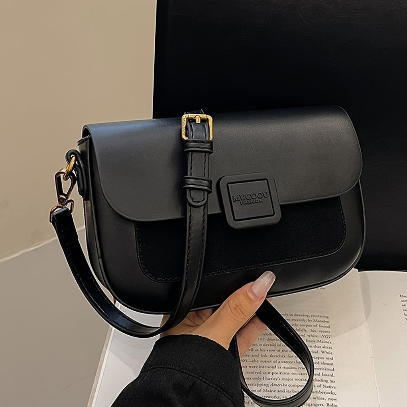 Stylish black crossbody bag with zip closure, made of durable PU material, inspired by retro design.