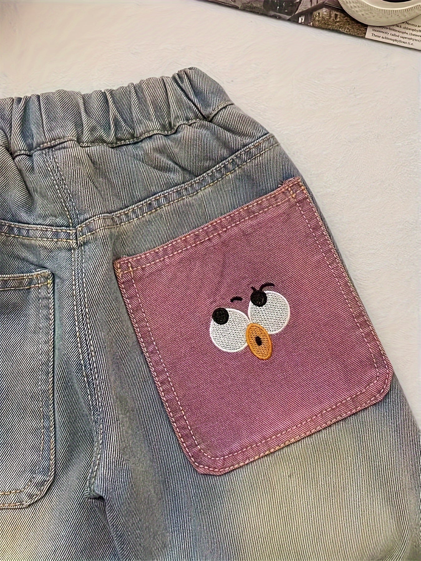 Cute cartoon print denim jeans for girls - comfy loose fit, machine washable, perfect for spring/fall