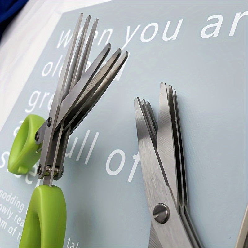 Multi-layer kitchen shears made of stainless steel for cutting herbs and green onions. These ergonomic metal shredder scissors come with a safety cover and easy-clean design.