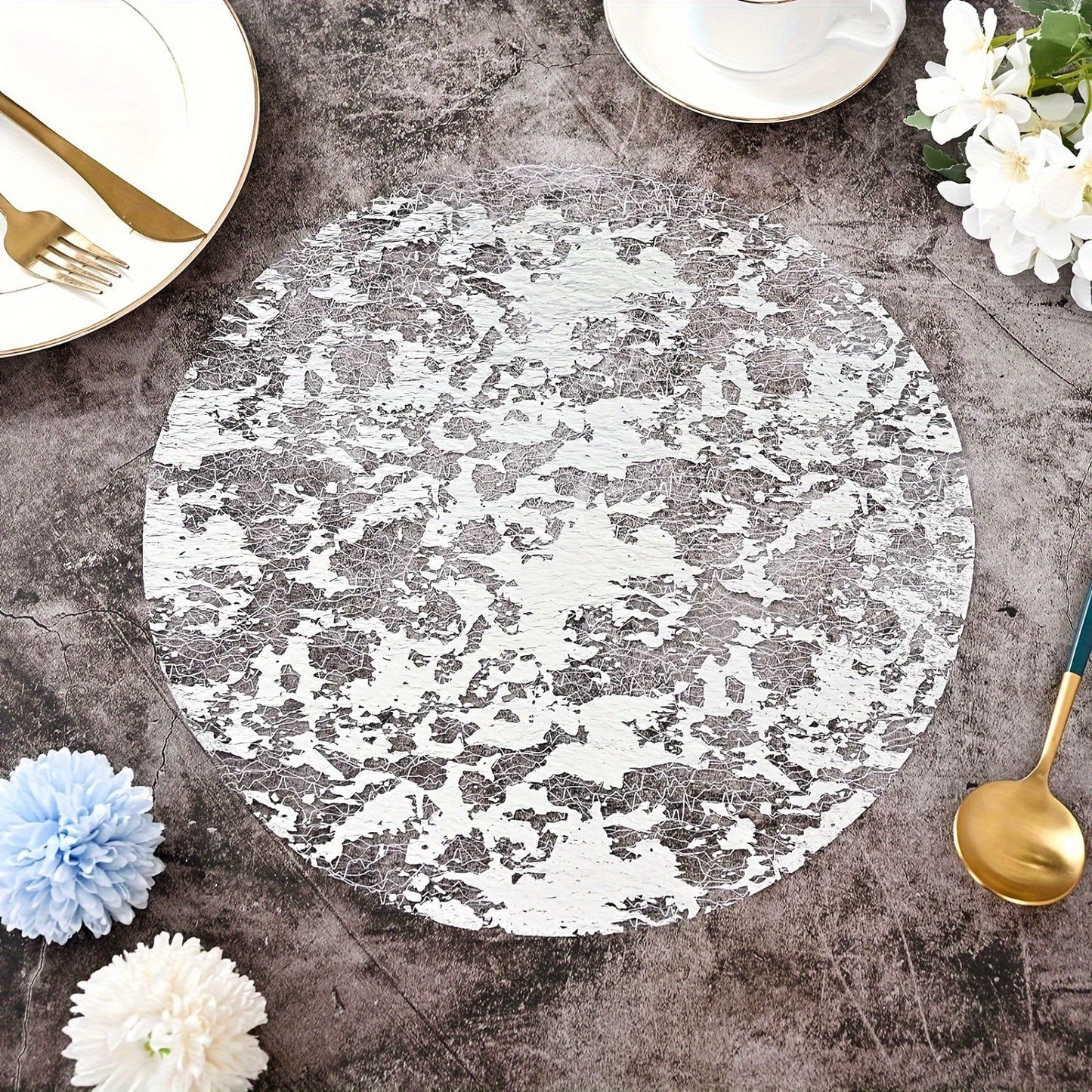 50 disposable round place mats, featuring a metallic design perfect for weddings and parties. Use these festive banquet table mats to add a touch of elegance to your event.