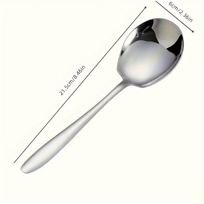 Elegant oversized stainless steel spoon for serving rice, eggs, and more with a shiny, durable finish.