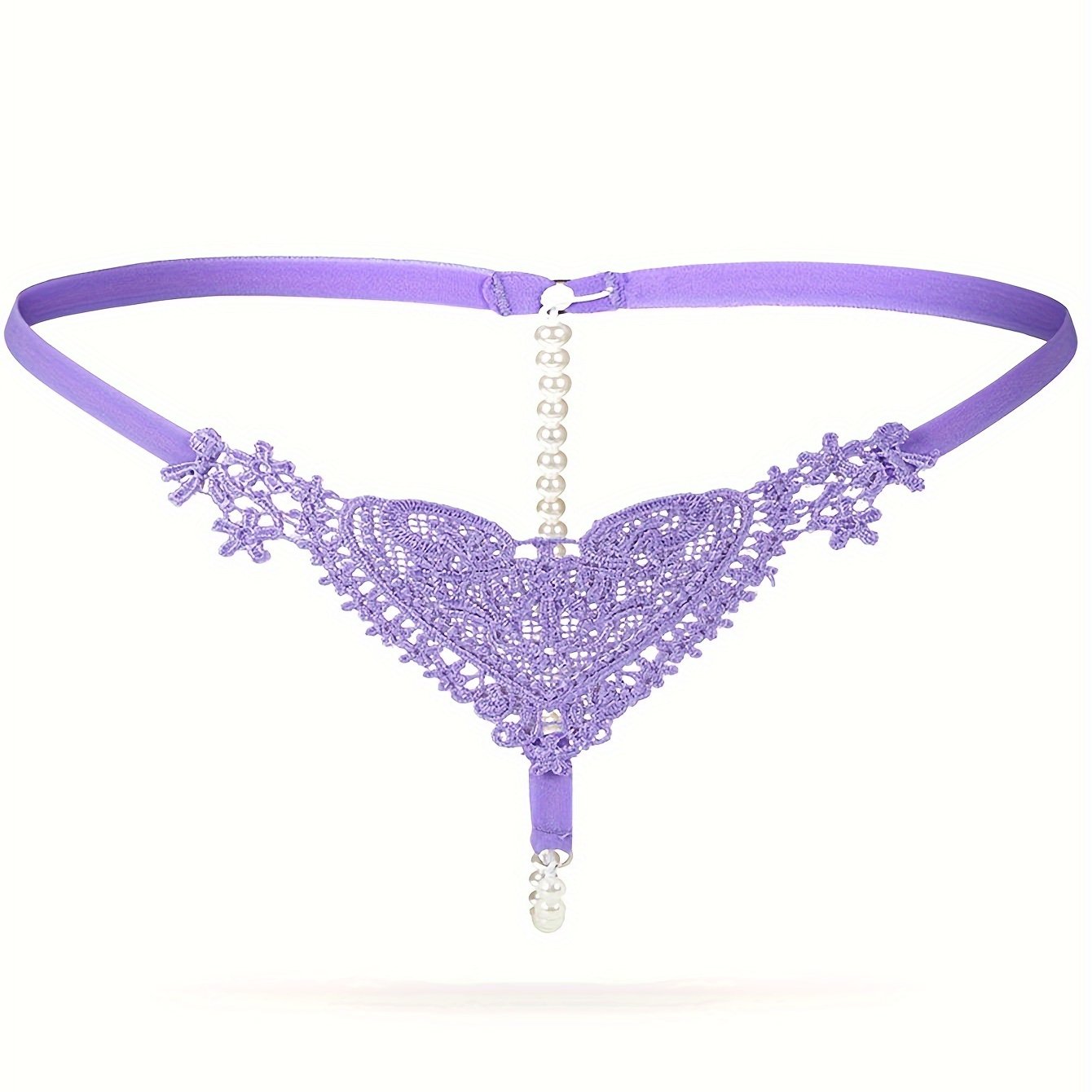 Low-rise thong with pearl embellishments and hollow out design. Breathable polyester, hand washable. Ideal for adults.