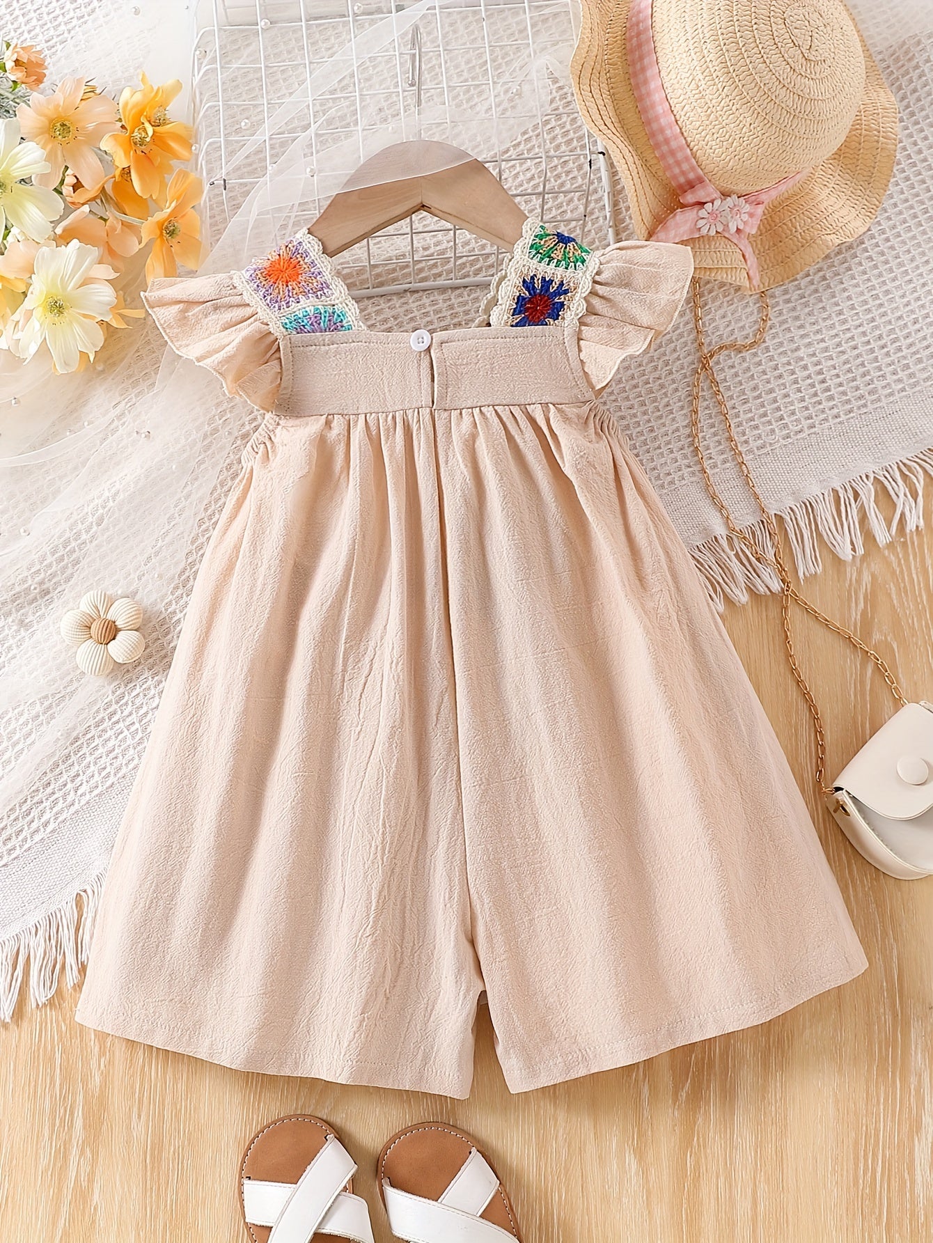 Baby girl summer romper with wide-leg skirt pants and ruffle sleeve vest, perfect for climbing and stylish fashion.