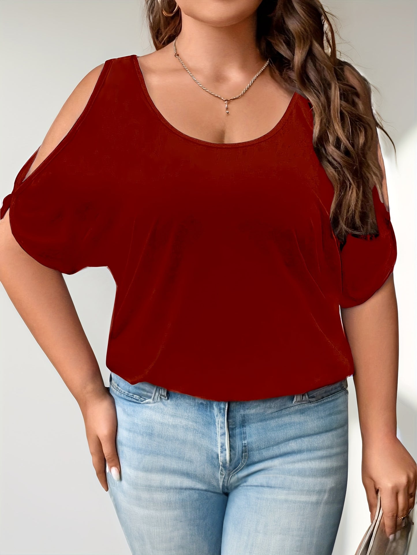 Solid cold shoulder tee for plus size women, casual crew neck with short sleeves.