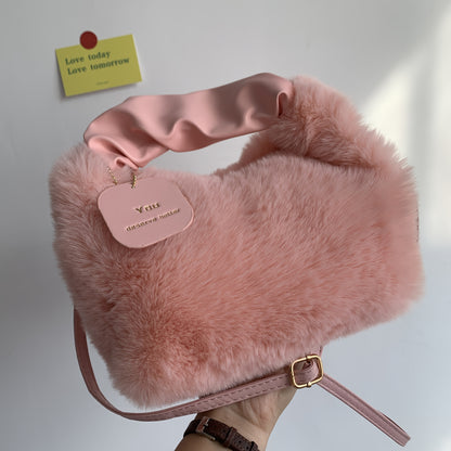 Stylish plush crossbody bag for women in faux fur with adjustable strap and zip closure. Perfect for fall/winter in khaki, light grey, dark khaki, cream, or pink.