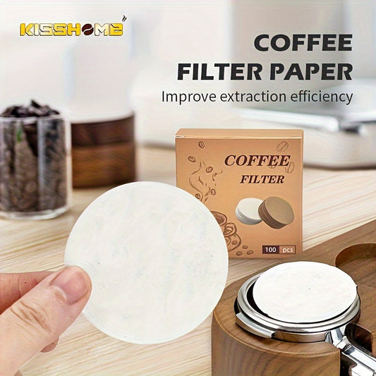 100 pieces of espresso filter paper for coffee, available in round shapes with diameters of 51mm, 53mm, and 58mm. Made from high tenacity fiber, this barista tool is designed to filter powder for portafilter basket coffee makers.