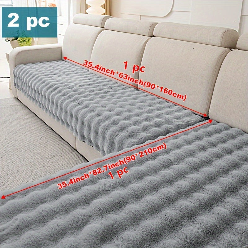 Luxurious faux rabbit fur sofa pads for winter warmth, pet-friendly, non-slip, machine washable, fits 2/3/4-seater sofas in grey color.