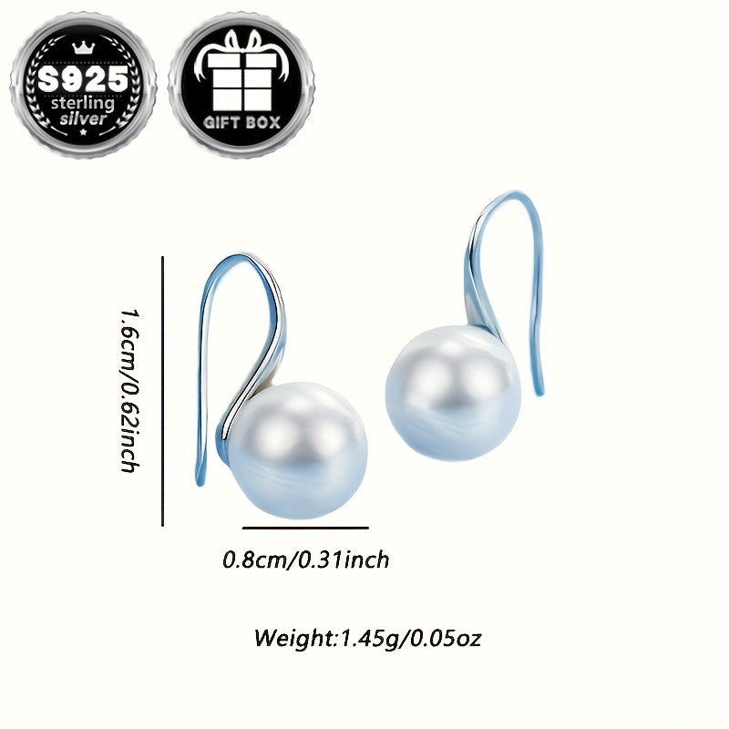 Classy and chic earrings designed for women, showcasing a timeless and minimalist style accented with lovely pearl details. Crafted from 1.55g of high-quality 925 silver, these earrings are perfect for everyday wear, work, special events, and make a