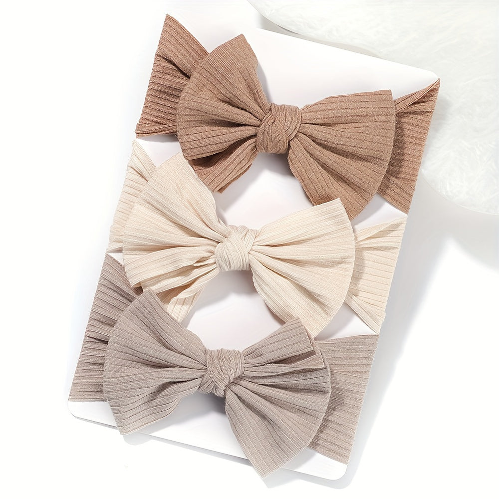 3 soft and stretchy bow hairbands for girls made of comfortable polyester, ideal for hairstyling