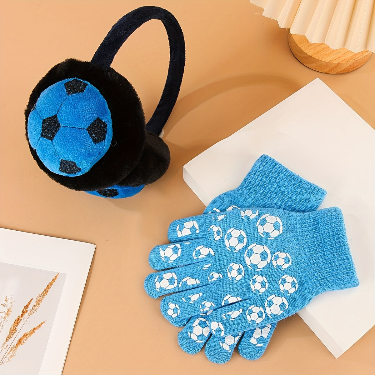 Stay warm and stylish with our Winter Sports Themed Acrylic Earmuffs and Gloves Set. These stretch fit ear warmers feature a knitting weave and are perfect for outdoor activities. Hand wash only. Suitable for both men and women, this unisex cold weather