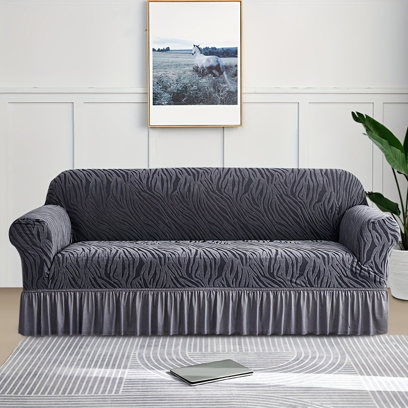 Wave pattern sofa slipcover with skirt, non-slip and dustproof. Protects furniture from cat scratches. Machine washable for easy cleaning. Suitable for bedroom, office, or living room décor.