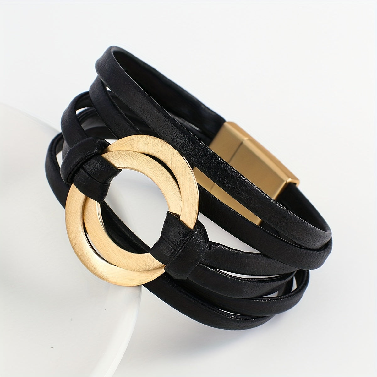 Artificial leather bracelet for women with double circle charm and magnet buckle clasp - a stylish wide bangle bracelet that makes a great gift.