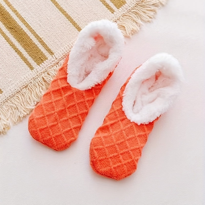 Women's warm non-slip coral fleece floor socks with plush knitted design.