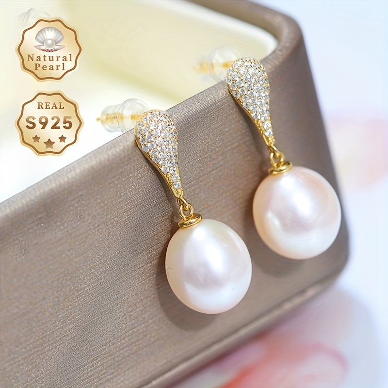 Elevate your style with the MUFAN Elegant Freshwater Pearl Drop Earrings. These stunning earrings feature 11-12mm lustrous teardrop-shaped pearls, set on S925 sterling silver hooks for a touch of vintage charm. The June birthstone makes them a perfect