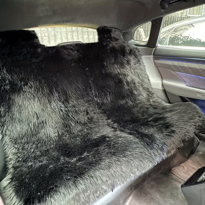 Thickened plush seat cushion for winter car driving.