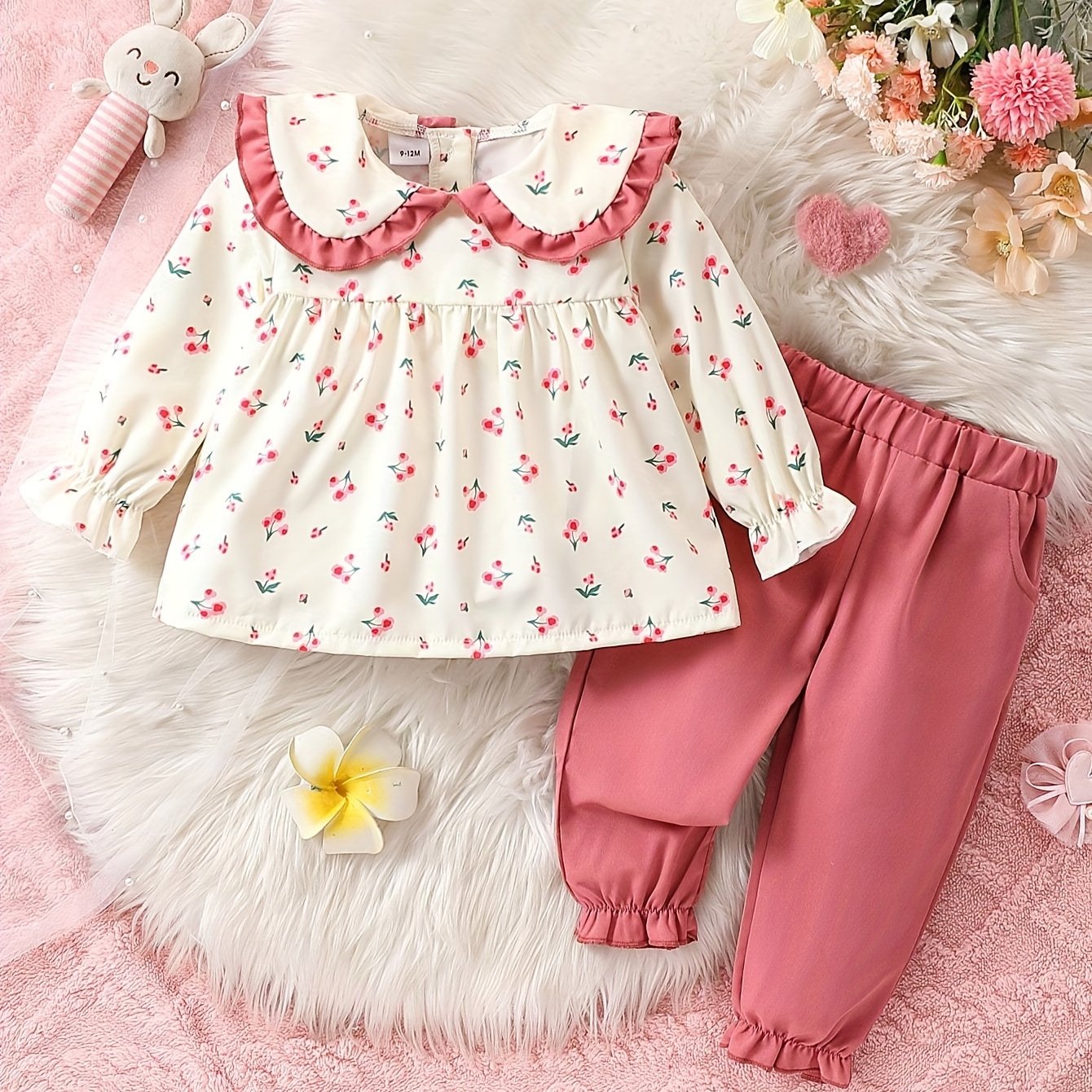 Cute baby girl outfit with floral top and pink jogger pants set - ideal for spring/autumn and parties. Made of polyester, machine washable and perfect for casual outdoor wear.