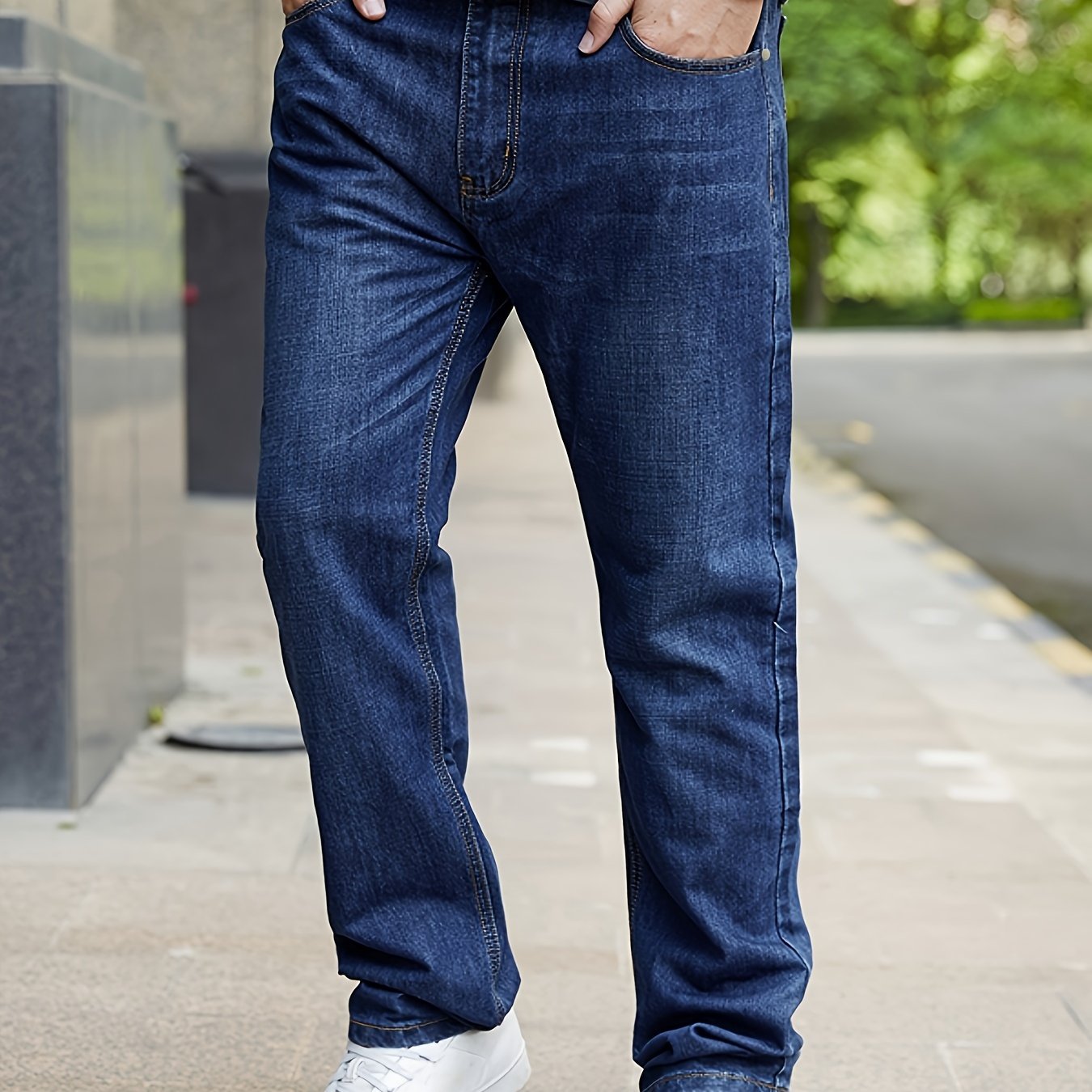 Men's elastic straight-cut jeans in large sizes, suitable for both casual and business wear.