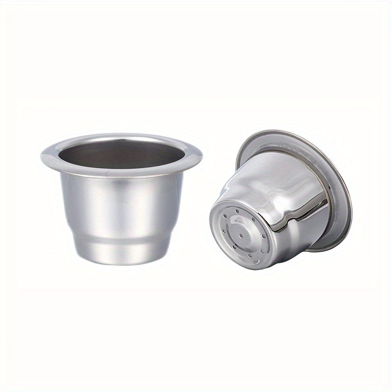 Reusable stainless steel Nespresso coffee capsule for home baristas, designed with a conical shape and flat bottom for improved brewing. Made with high-quality materials for a refillable and environmentally friendly option.