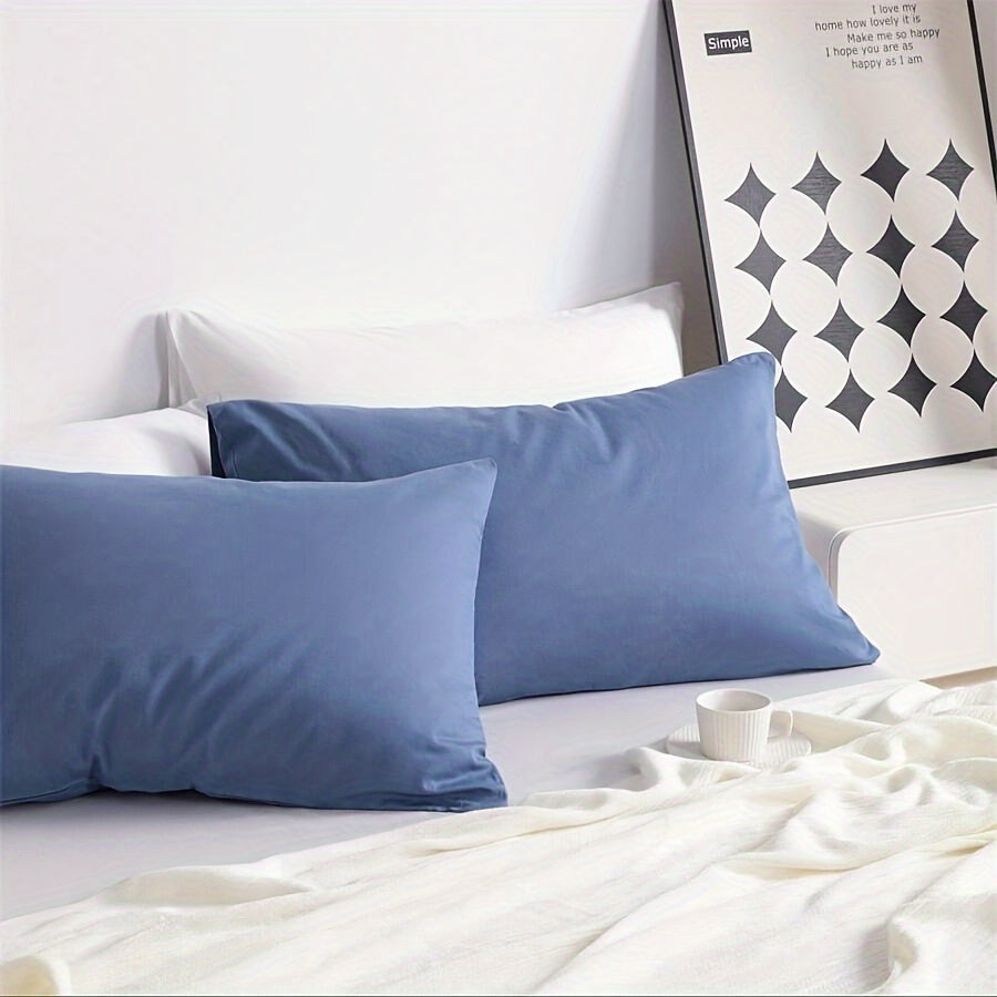 Enhance your bedroom, guest room, or hotel with our 2-piece set of solid color versatile pillowcases. Made from soft and breathable material with a frosted treatment, these pillowcases are conveniently machine washable. Available in three classic colors