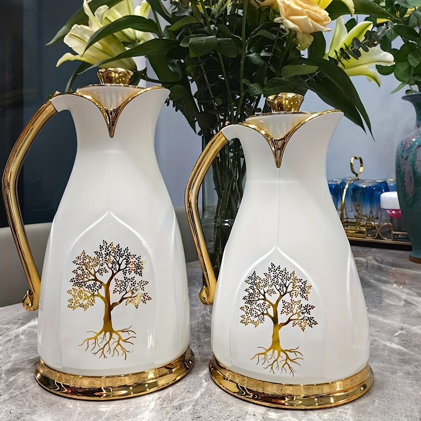 Two Vacuum Insulated Thermal Carafes for Coffee and Tea - Stainless Steel Double-Wall Flasks in 1L and 0.7L sizes, featuring an elegant Golden Tree Design. Keeps beverages hot without the need for electricity.